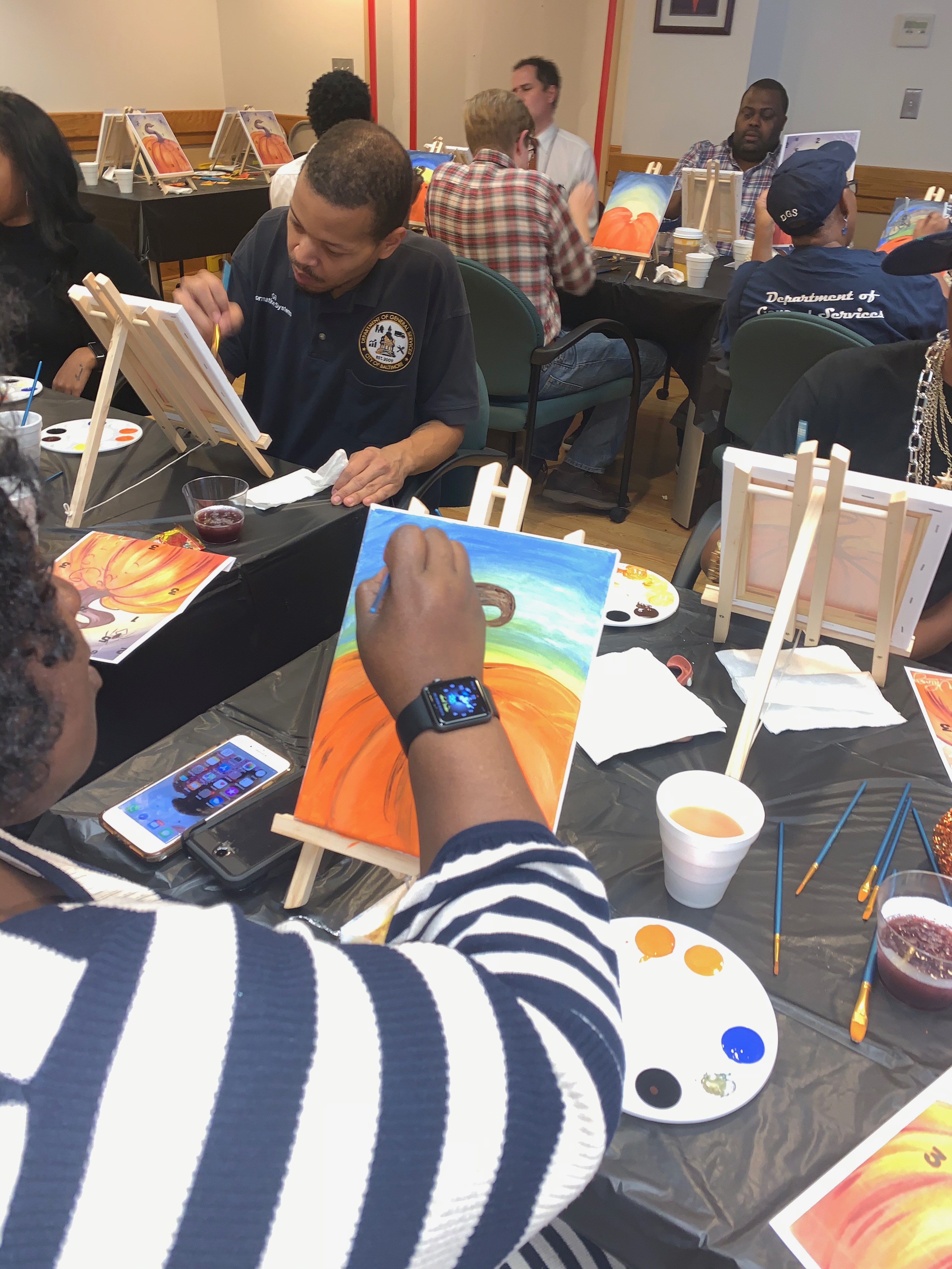 Employees painting