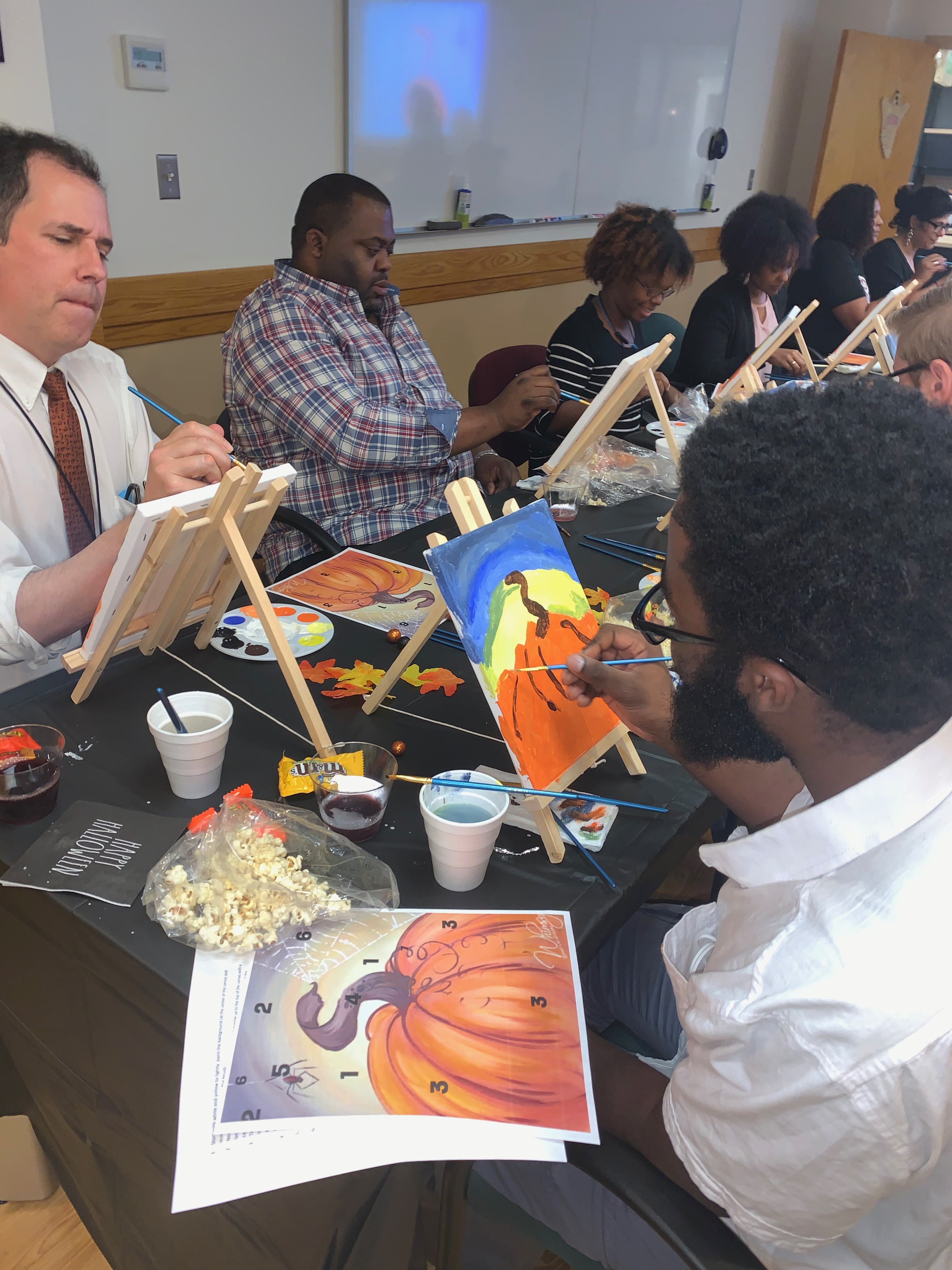 Employees painting